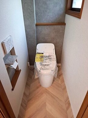 洗練されたトイレ空間のアフター画像