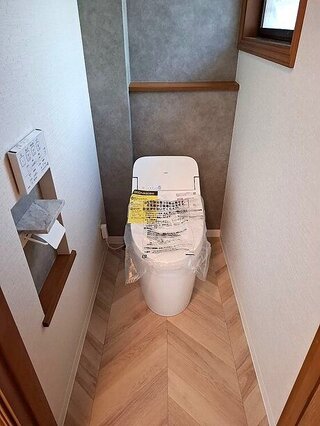 洗練されたトイレ空間のアフター画像